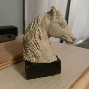 Small cement horse head.